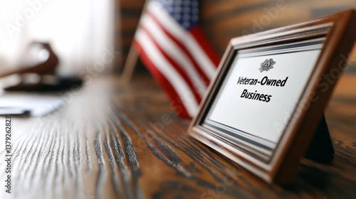 Veteran owned business certification display with american flag, wooden desk setting