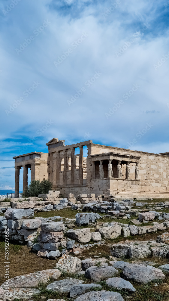 Fototapeta premium ancient ruins with columns and view of the city, stones and the sky