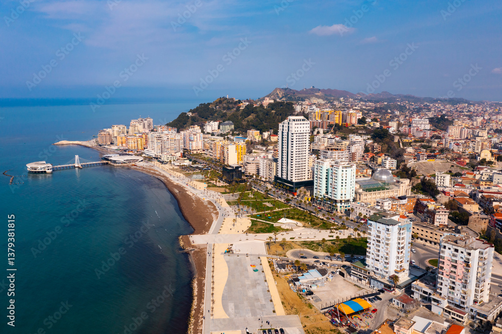 Fototapeta premium Bird's eye view of Albanian city Durres. Buildings and beach along Adriatic sea coast.