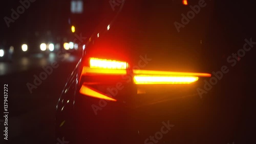 Wallpaper Mural Close up of a car's blinker indicating the direction change at night Torontodigital.ca