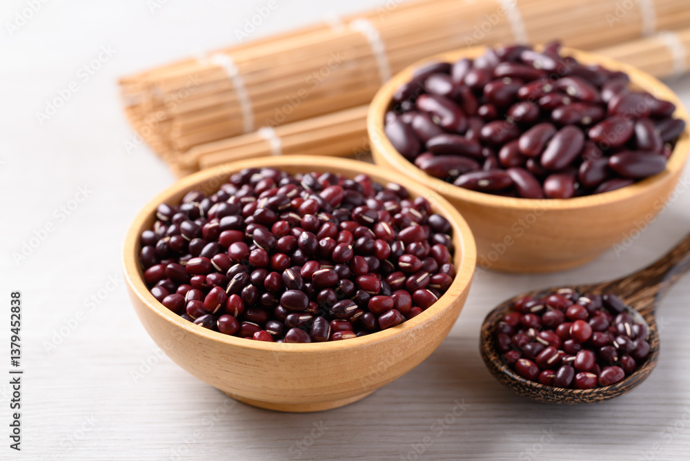 Azuki beans and red kidney beans in wooden bowl on white background, Food ingredient Azuki beans and red kidney beans in wooden bowl on white background, Food ingredient