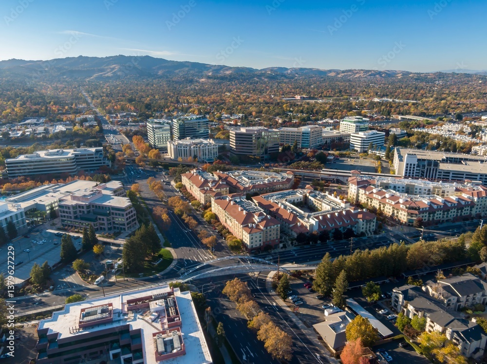 Fototapeta premium Aerial view of Pleasanton, California, USA, showcasing the city's urban landscape, architecture, and transportation infrastructure during the autumn season.