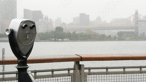 New York City waterfront skyline, Manhattan Midtown buildings, riverfront skyscrapers by East river. Waterside cityscape, tower viewer, Gantry Plaza. Long Island, Queens. United States tourism. Rainy.