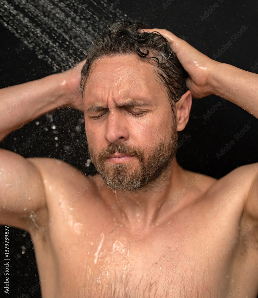 Obraz premium Man washing hair closeup portrait. Bathing shower washing hair head in bathroom. Male model washing hairs in shower. Man taking shower. Guy showering, hair care. Male shampoo and washing hair concept.