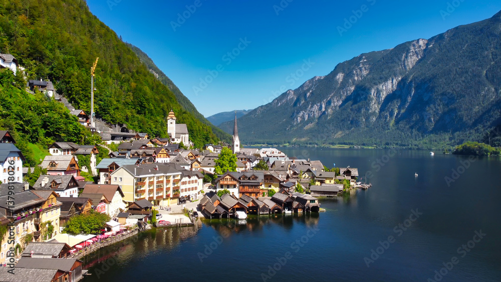 Stunning aerial view of Hallstatt, showcasing the picturesque village and serene lake nestled in the Austrian Alps