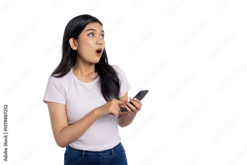 Surprised young Asian woman holding smartphone with open mouth, looking away with shocked expression, isolated on transparent background Surprised young Asian woman holding smartphone with open mouth, looking away with shocked expression, isolated on transparent background