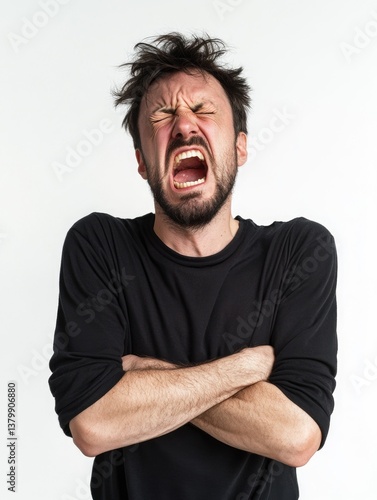 Obraz na płótnie A man with a beard and a black shirt is making a loud noise. He is angry and frustrated w salonie