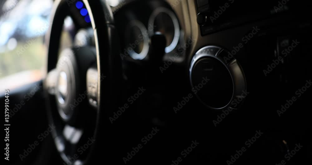 Steering wheel and dashboard of off-road vehicle. Car designed with modern design equipped with advanced technology for comfortable driving experience Steering wheel and dashboard of off-road vehicle. Car designed with modern design equipped with advanced technology for comfortable driving experience