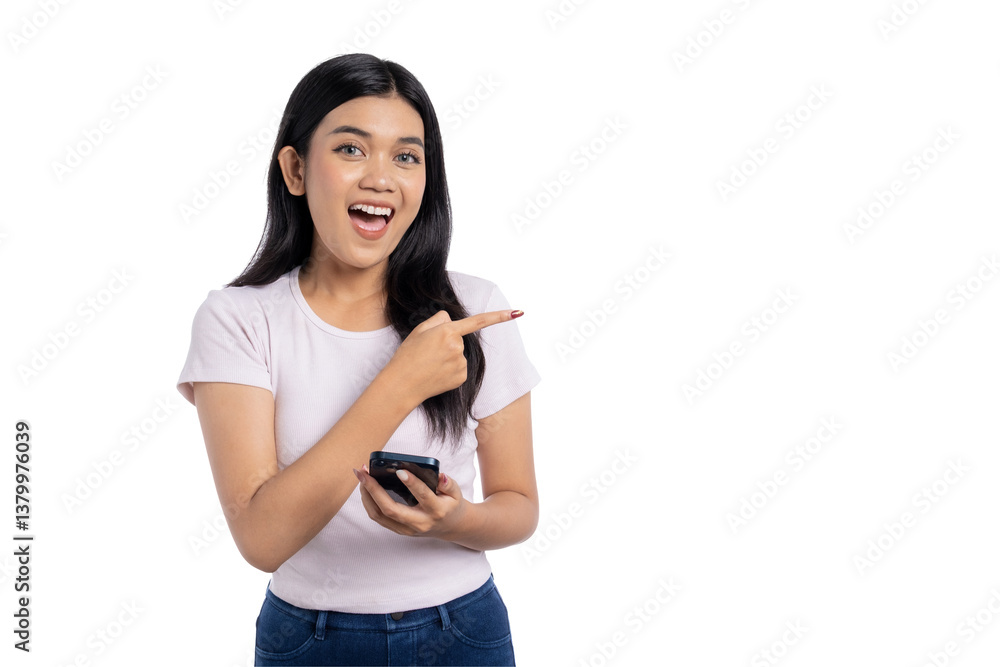 Young Asian woman pointing at copy space and holding mobile phone, looking excited and happy, isolated on transparent background Young Asian woman pointing at copy space and holding mobile phone, looking excited and happy, isolated on transparent background