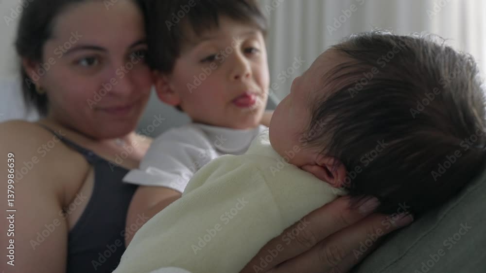 Mother and older sibling touching newborn baby’s head with love and care. tender moment in the hospital bed captures the gentle interaction and bond within the family, Mother and older sibling touching newborn baby’s head with love and care. tender moment in the hospital bed captures the gentle interaction and bond within the family,