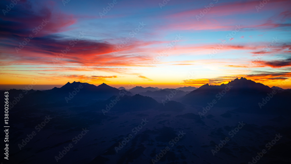 Fototapeta premium Beautiful colourful sunset behind the mountains