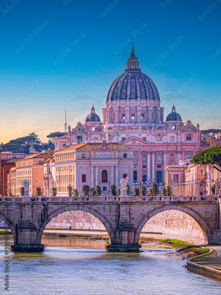 Fototapeta premium Rome city skyline in springtime, featuring the iconic St. Peter's Basilica and the graceful Ponte Sant'Angelo spanning the River Tiber in the historic heart of Italy’s eternal city