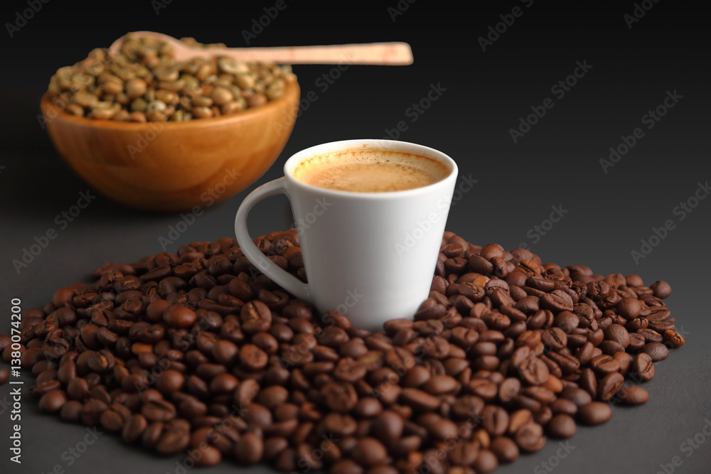 Espresso Surrounded by toasted Beans, with Green Coffee Beans in a Wooden Bowl Espresso Surrounded by toasted Beans, with Green Coffee Beans in a Wooden Bowl