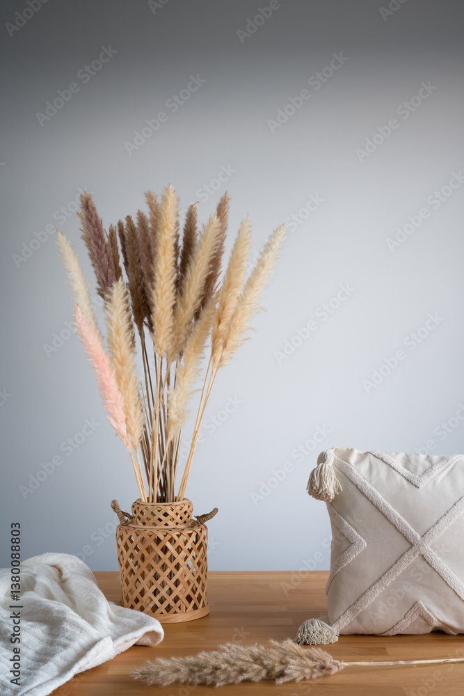 Bohemian Style: Pampas Grass, Woven Vase and Textured Pillow Still Life