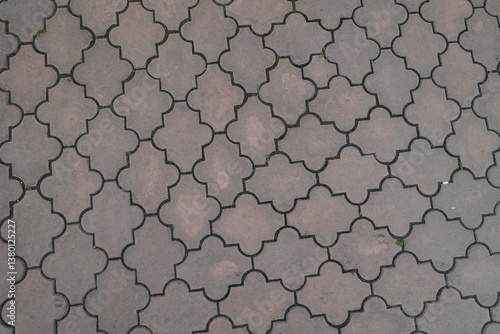 Obraz na płótnie Background - pale pink pavement of interlocking concrete tiles with moroccan lattice layout w salonie