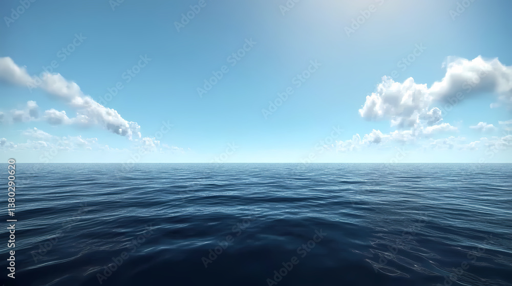 Fototapeta premium Calm ocean reflecting blue sky with few clouds on sunny day
