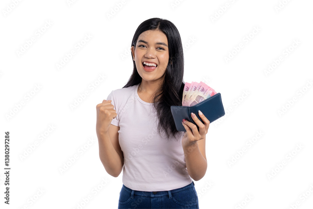 Happy young Asian woman celebrating success while holding a wallet full of Indonesian rupiah banknotes, isolated on transparent background Happy young Asian woman celebrating success while holding a wallet full of Indonesian rupiah banknotes, isolated on transparent background