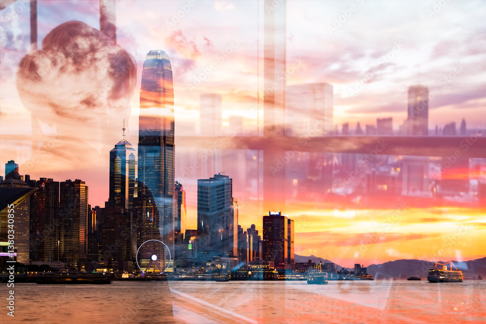 Obraz premium Hong Kong skyline at sunset using double exposure technique, blending cityscapes with a warm, vibrant sky.