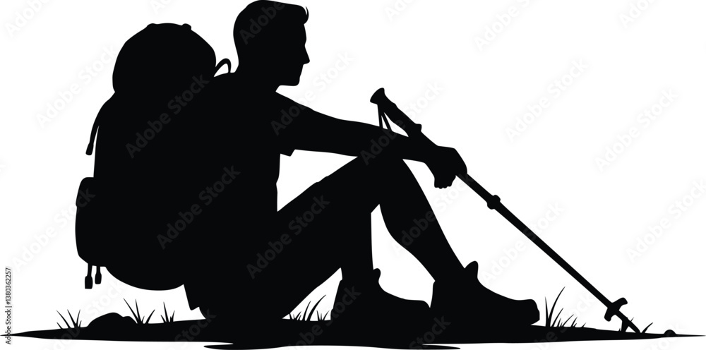 Obraz premium Silhouette of a resting hiker sitting on the ground with a backpack and trekking pole