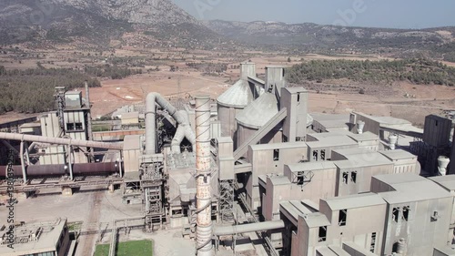 Aerial view of cement producing plant structures. Aerial view of huge industrial factory