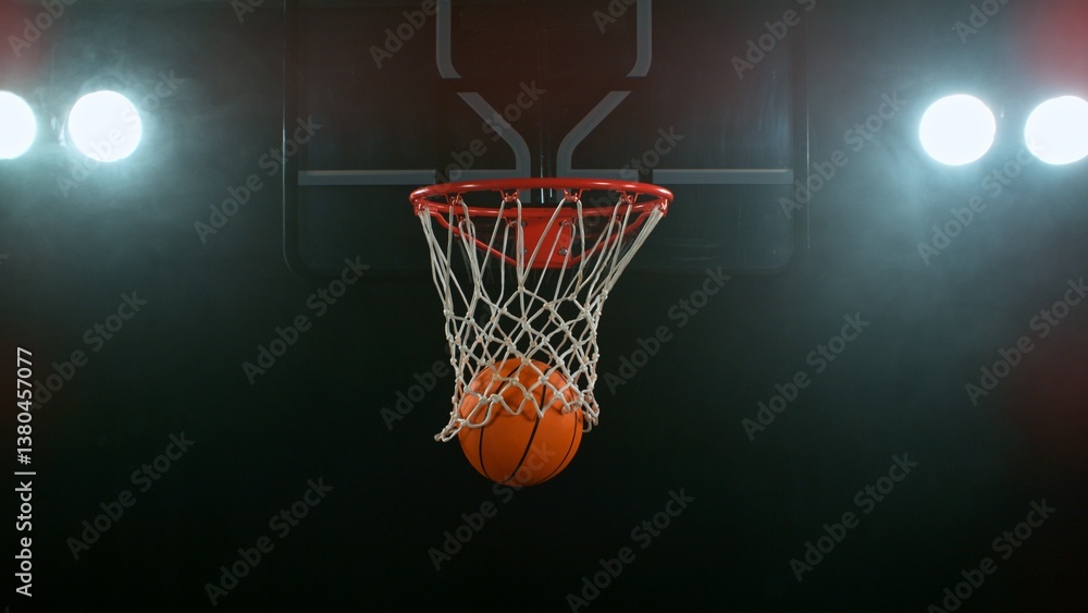 Freeze motion of basketball ball hitting the basket Freeze motion of basketball ball hitting the basket