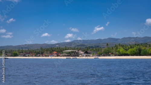 Obraz na płótnie Enjoy a stunning beach view along a beautiful coastline, surrounded by lush foliage and a clear blue sky, perfect for relaxation and outdoor adventures, Nusa Penida, Bali, Indonesia w salonie