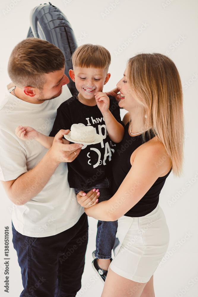 A Joyful Family Moment The Tender ParentChild Bond Displayed in a Studio Setting, Capturing the Affection and Love That Flourish During Special Times Together, Full of Fun and Smiles
