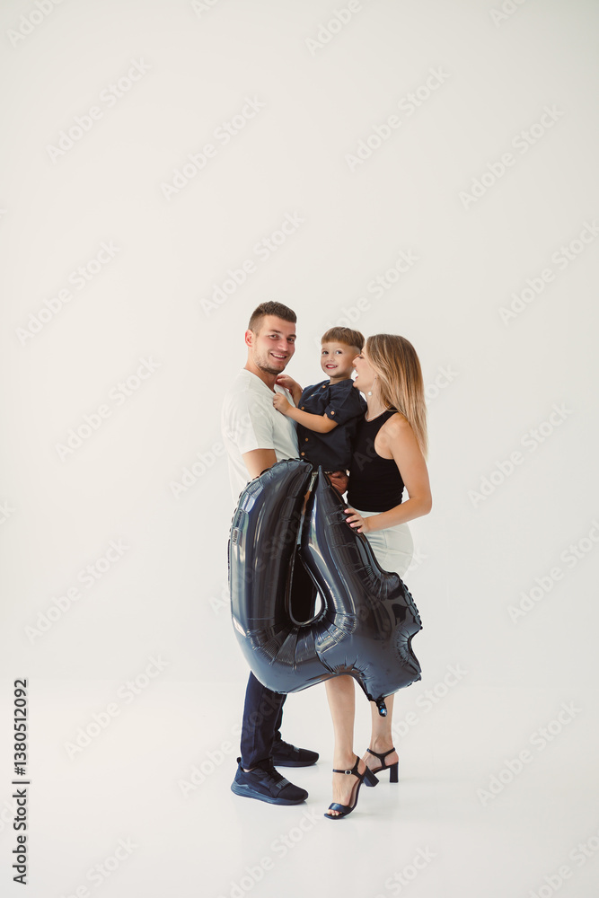 A joyful family celebration marked by a child excitedly holding a colorful balloon with the number 4. Its a memorable day filled with fun, love, and togetherness, creating delightful memories