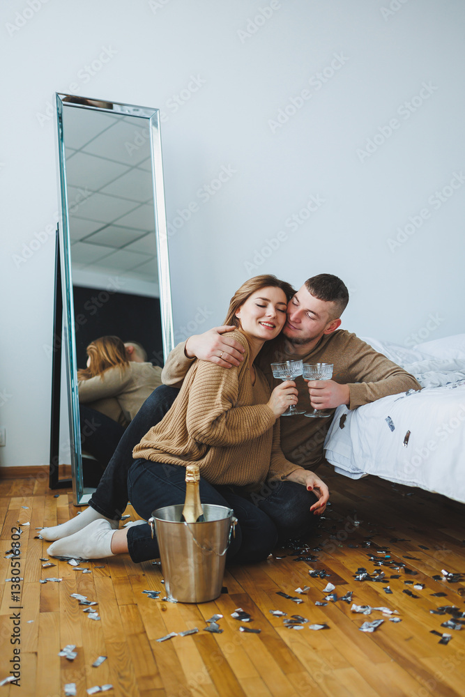 A Romantic Celebration at Home featuring Champagne, with Joyful Moments Cherished, Laughter Shared, and the Perfect Atmosphere for Love and Togetherness, Creating Lasting Memories
