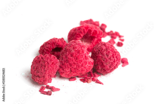 dried raspberries on white background