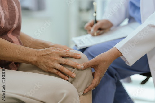 Wallpaper Mural Doctors examine an elderly patient who is suffering from knee pain due to arthritis. The patient is being assisted in his recovery, with an emphasis on pain management and improving mobility. Torontodigital.ca
