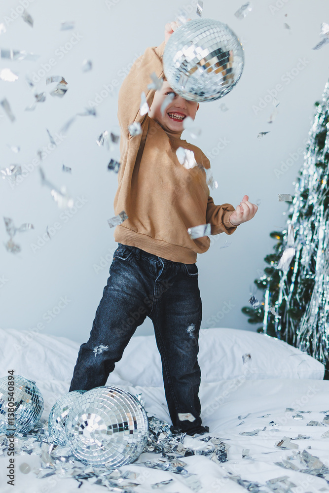 A lively and joyful child is celebrating with a shiny disco ball and colorful confetti in a wonderfully festive setting, filled with excitement and creativity, capturing the essence of childhood fun