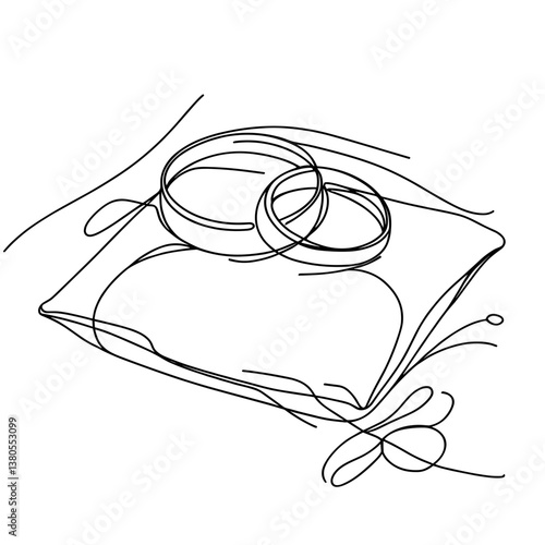 Wedding rings on a decorative pillow in a line drawing style  
