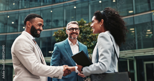 City, business people and smile with handshake for welcome, greeting and agreement for realtors. Urban, clients and real estate agent with shaking hands for introduction, deal success and partnership