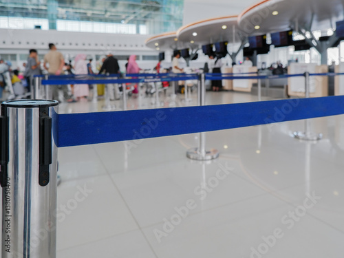 check in queue line tape at the airport airplane. selective focus