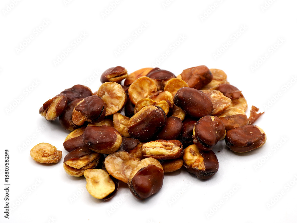 A pile of lablab beans or also known as kacang koro sits neatly against a white background A pile of lablab beans or also known as kacang koro sits neatly against a white background