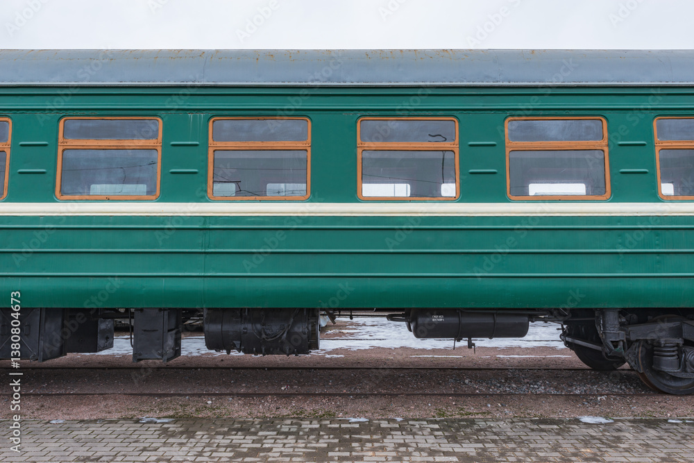 Obraz premium Retro passenger train carriage by the platform.