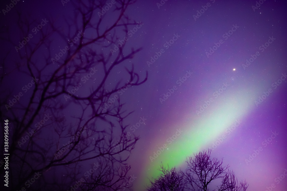 Aurora borealis, polar lights with Milky Way stars.