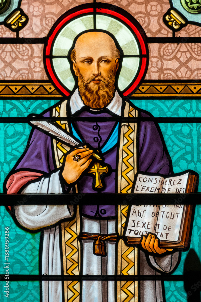 Obraz premium Stained glass (1931) of St. Francis de Sales or Saint François de Sales. Doctor of the Catholic Church, founder of the Order of the Visitation.