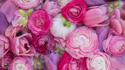seamless wallpaper with fresh pink and white ranuncuulus flowers with waterdrops on petals