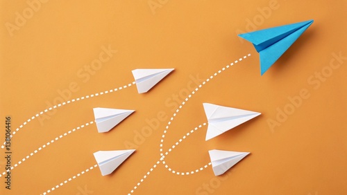 vector illustration of origami paper plane blue paper, airplane leading a group of white paper airplanes. photo