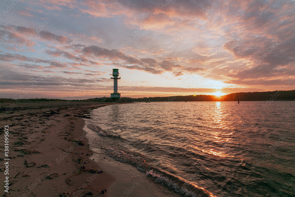 Fototapeta premium View to Falckenstein beach with lighthouse at sunrise.