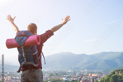 Traveler backpacker in front of a city destination scenic