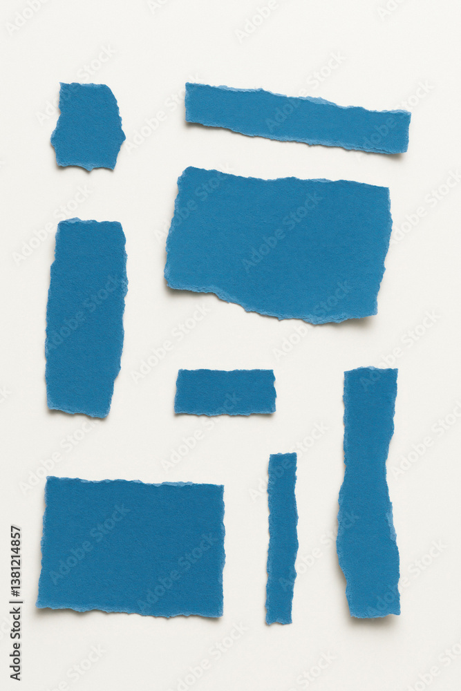 Naklejka premium Blue Torn Paper Collection on Light Background