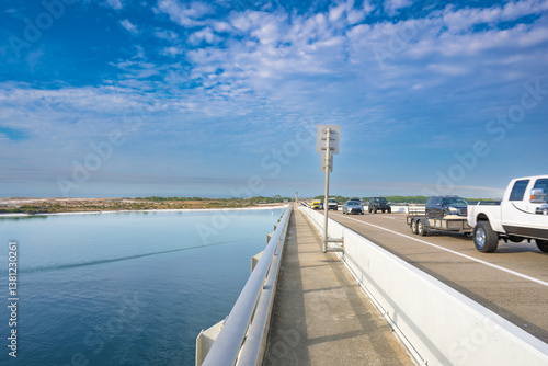 vehicle bridge with walking path at destin harbor