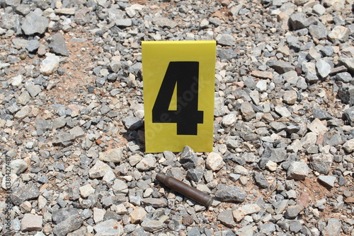 Empty Rifle Cartridge and Evidence Marker