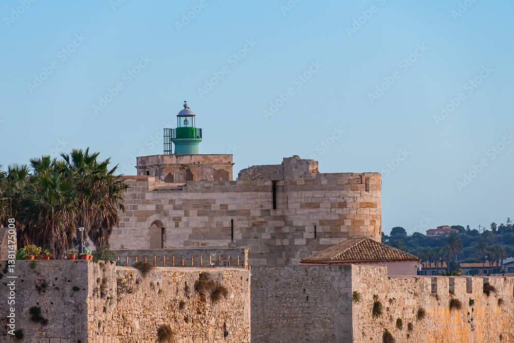 Maniace Castle (Castello Maniace, 1232 -1240) - ancient magnificent citadel and castle at the easternmost point of the Ortygia island. Syracuse, Sicily, Italy.