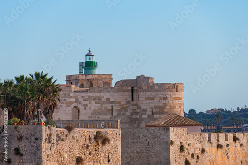 Obraz na płótnie Maniace Castle (Castello Maniace, 1232 -1240) - ancient magnificent citadel and castle at the easternmost point of the Ortygia island. Syracuse, Sicily, Italy. w salonie