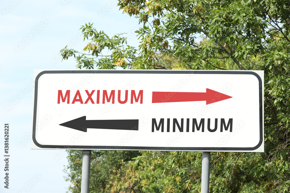 Fototapeta premium Road sign with different directions - Maximum or Minimum outdoors