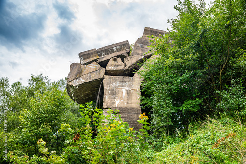 Destroyed old railway bridge in Kruklanki, Poland, August 2021